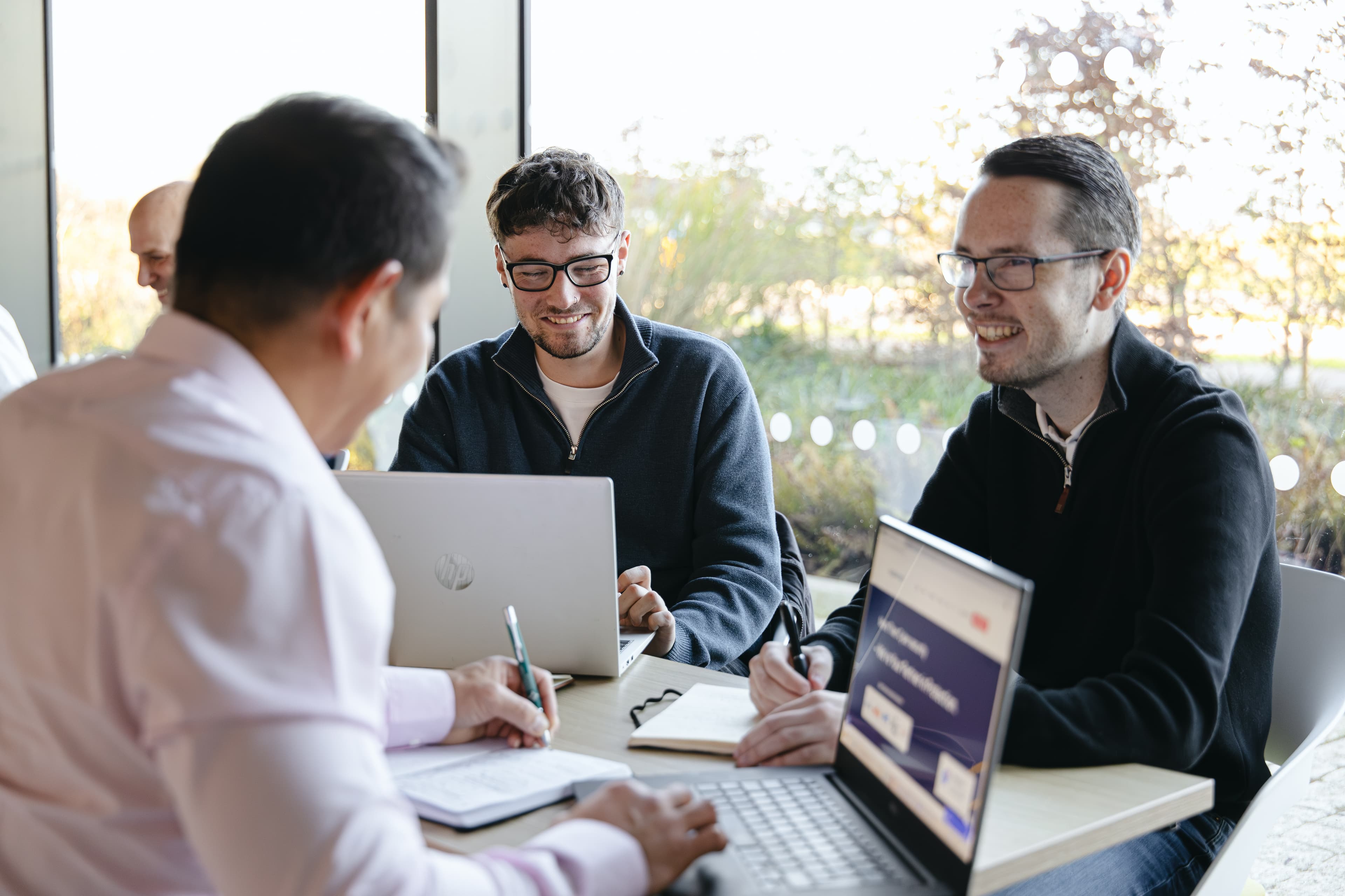 Digital Defence Group team reviewing vulnerability scanning results